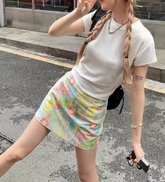 Minifalda de malla con estampado floral